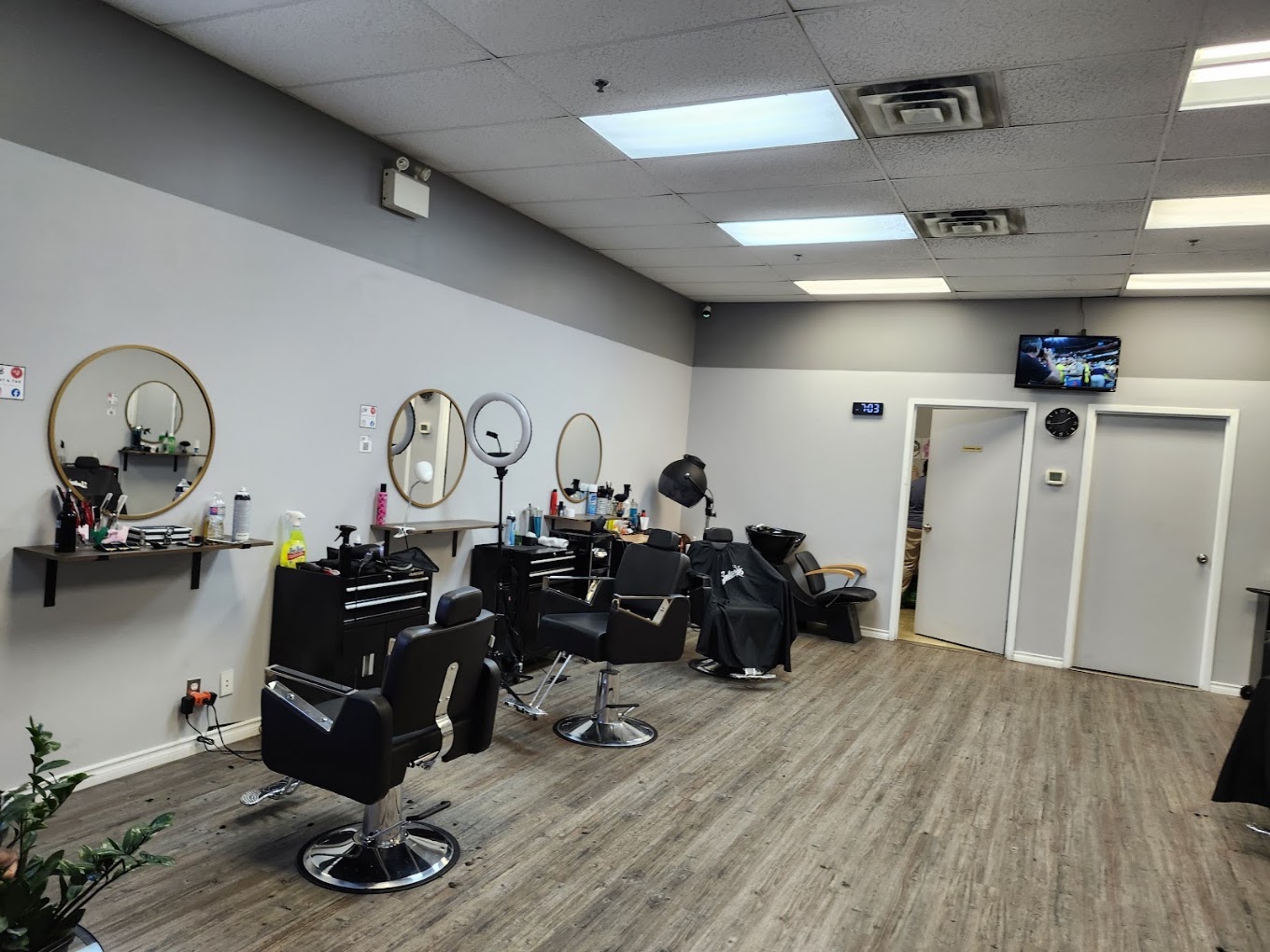 Interior of Salon 6 with styling chairs and mirrors